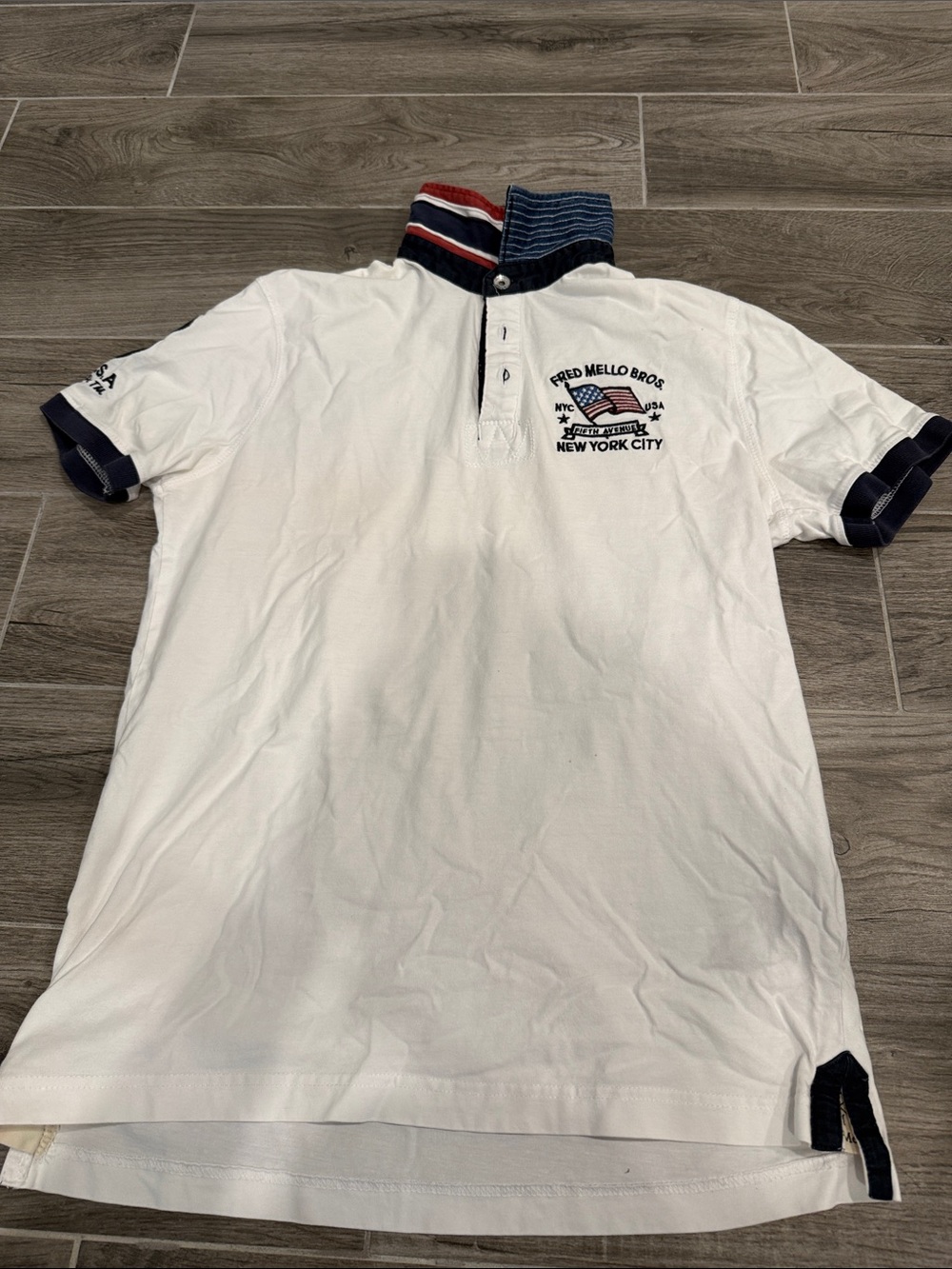 Fred Mello White Polo with Navy and Red Collar Stripes